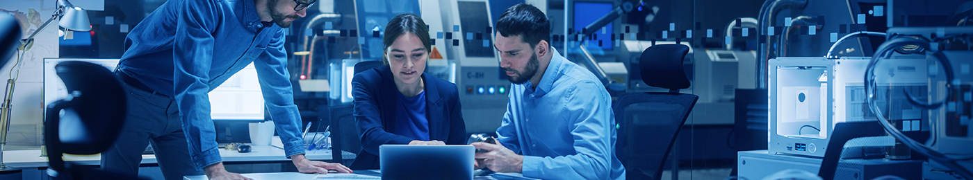 Engineers designing at computer