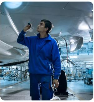 Engineering Tech with aircraft